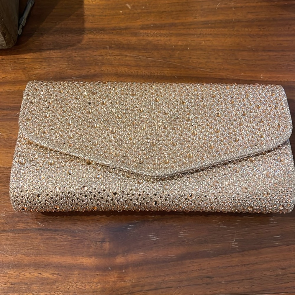Gold sparkling clutch